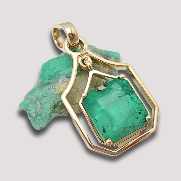 Aretes de Oro y Plata con Esmeralda