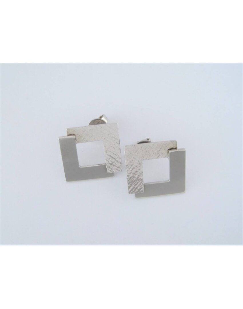 Topos en plata ley 950 con diseño geométrico moderno